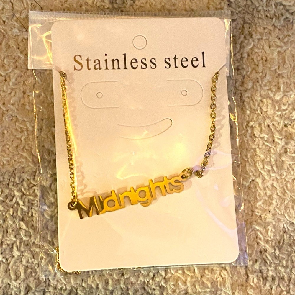 New. MIDNIGHTS Taylor Swift album necklace. Stainless steel in gold.